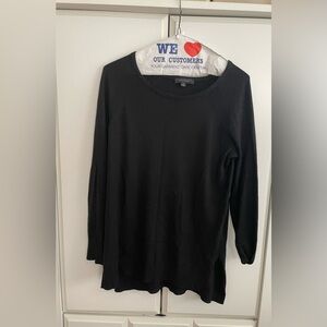 Women’s black color top.